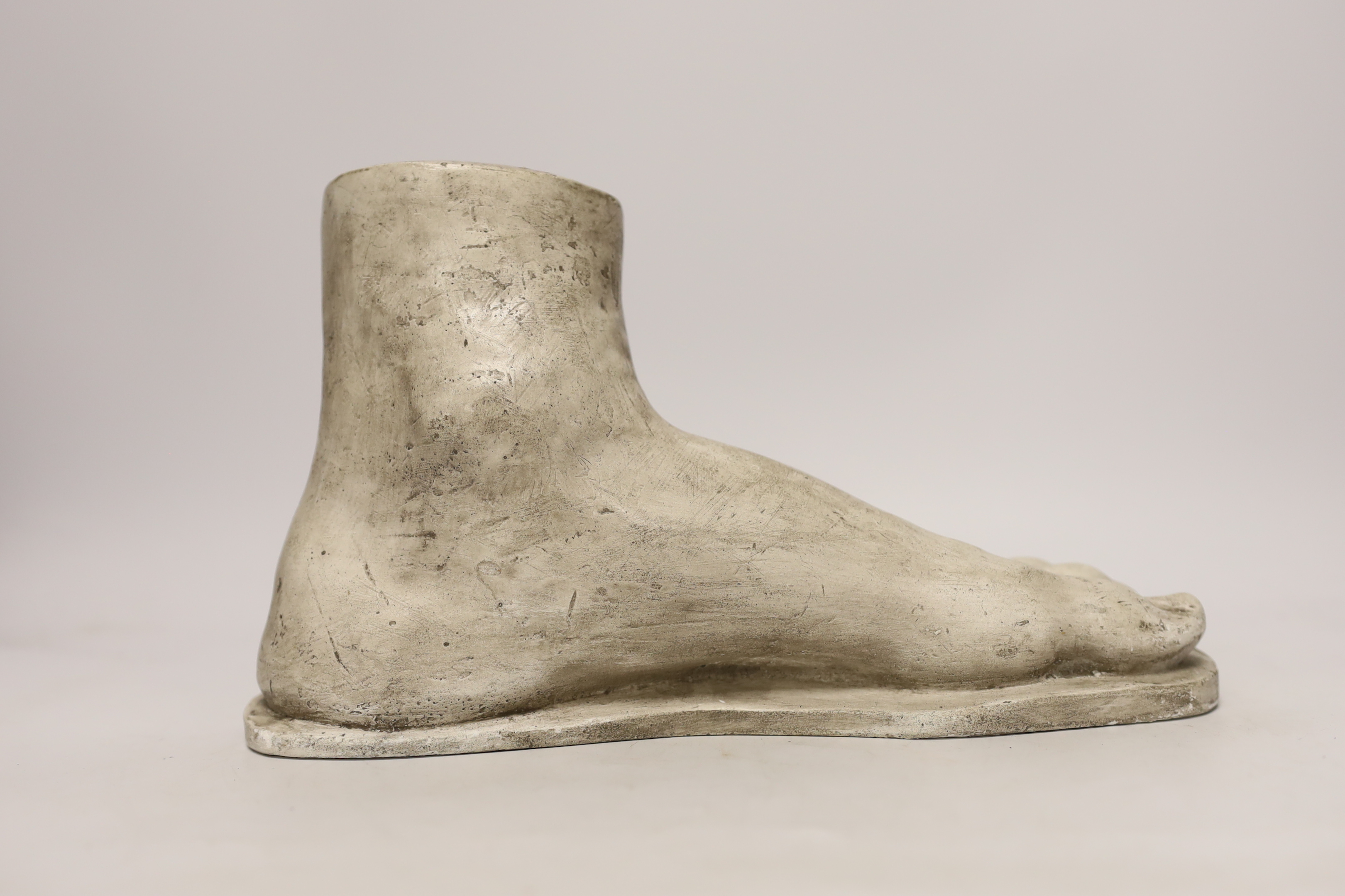 A composite marble foot, 28cm long, 17cm high